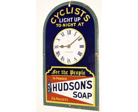 A Hudson's Soap enamel advertising clock sign, with dummy clock face and hands, inscribed "Cyclists Light Up To-Night At" abo