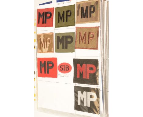 A collection of approximately 300 Military cloth badges, to include: Military Police, Military Provost Guards, 17th Port Regi