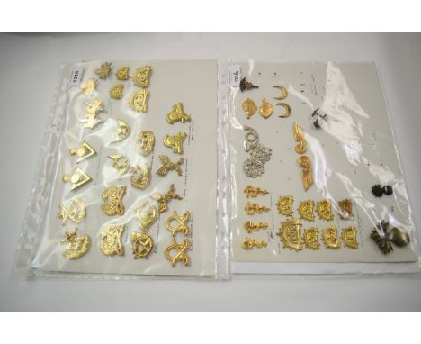A collection of 22 pairs and 5 single Finnish Military badges, to include: Artillery Measuring Battery, Military War Academy 