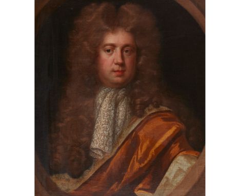 18TH CENTURY FRENCH SCHOOL HALF LENGTH PORTRAIT OF A GENTLEMAN IN A WIG, WITH GOLD CLOAK AND LACE oil on canvas, feigned oval