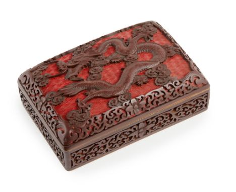 CHINESE ENAMELLED AND CARVED LACQUER BOX 20TH CENTURY the lid carved in relief with a dragon surrounded by auspicious clouds,