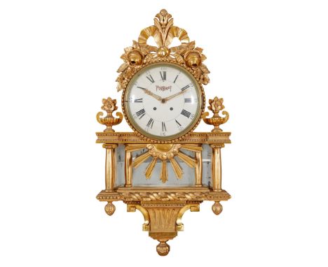 FRENCH GILT WOOD CARTEL WALL CLOCK   19TH CENTURY surmounted by roses, the cream dial with Roman and Arabic numerals, above m