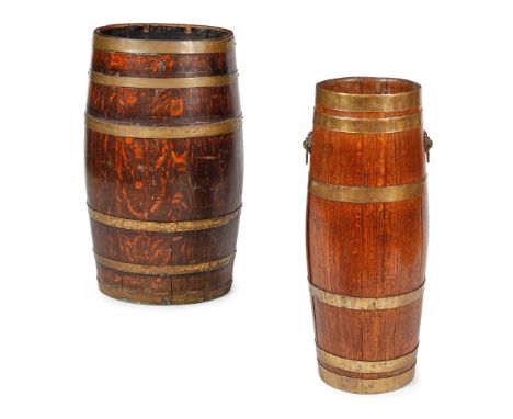 TWO OAK AND BRASS BANDED BARREL STICK STANDS   LATE 19TH/EARLY 20TH CENTURY the smaller with lion mask handles(34cm wide, 66c