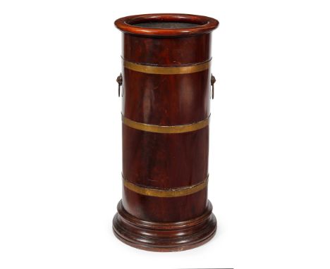 VICTORIAN MAHOGANY AND BRASS BOUND STICK STAND LATE 19TH CENTURY of circular form, on a moulded base(29cm diameter,&nbsp;64cm