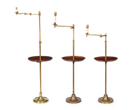 NEAR PAIR OF ADJUSTABLE BRASS FLOOR LAMPS   LATE 19TH CENTURY each with dished tray on splayed bases; together with ANOTHER S