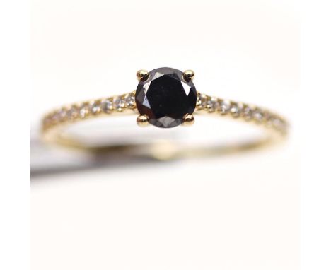 A gold on 925 silver solitaire ring set with a brilliant cut fancy black diamond, (O).