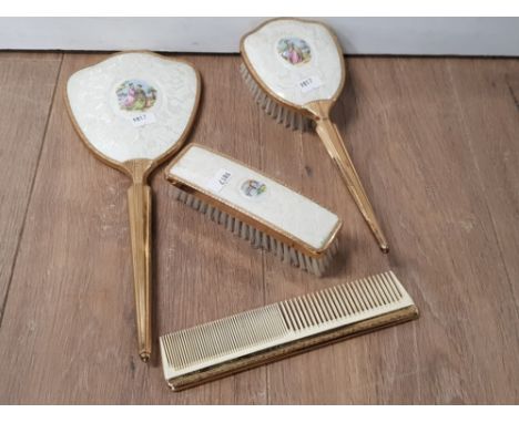 A VINTAGE BRUSH AND MIRROR SET