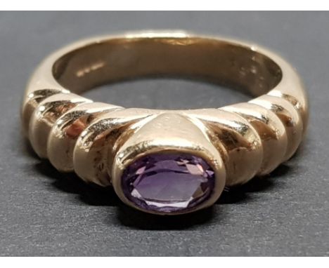 9CT GOLD AND OVAL CUT AMETHYST SOLITAIRE RING, 6.1G SIZE O