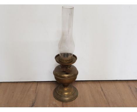 A VINTAGE BRASS OIL LAMP