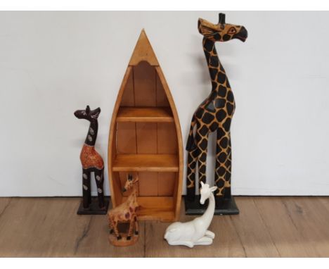 A LOT CONTAINING 4 GIRAFFE ORNAMENTS INC 1 FROM THE LEONARDO COLLECTION ALSO TOGETHER WITH A WOODEN BOAT SHAPED BATHROOM WALL