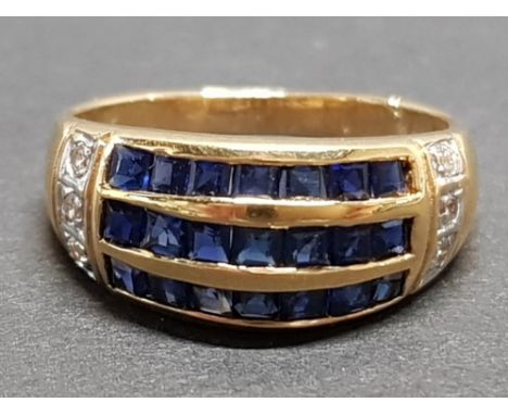 CHANNEL SET SAPPHIRE RING WITH DIAMOND SHOULDERS SET IN 18CT GOLD, 3.8G SIZE K