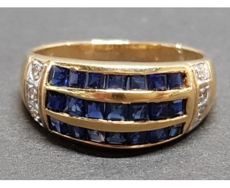 CHANNEL SET SAPPHIRE RING WITH DIAMOND SHOULDERS SET IN 18CT GOLD, 3.8G SIZE K