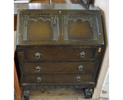 A three drawer fall front bureau, a barley twist side table and a five drawer cabinet containing tools