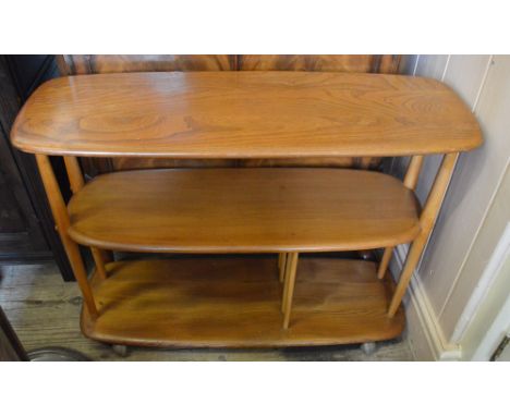An Ercol low room divider