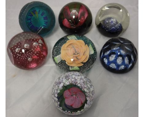 A collection of seven Caithness Royal Commemorative paperweights including "Her Majesty the Queen's 80th Birthday", "70th Bir