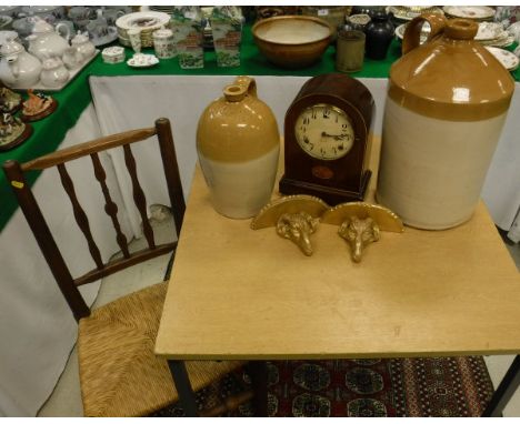 A circa 1900 mahogany and inlaid cased dome top mantle clock, the eight day movement with circular dial and Arabic numerals, 