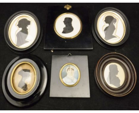 An early 19th Century miniature portrait of a woman with lace cap, housed in an ebonised frame, together with five various si
