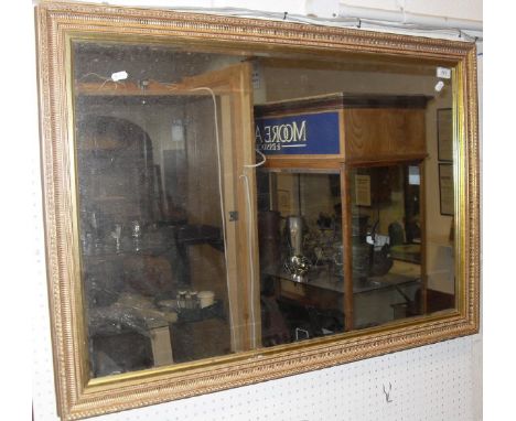Two rectangular wall mirrors and a white painted dome topped wall mirror CONDITION REPORTS Gilt rectangular mirror measures a