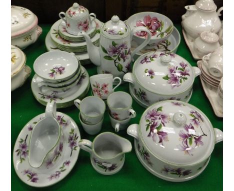 A Spode oven to table ware part dinner/tea service, Oriental Flowers pattern W155 (NB two different colour ways), together wi