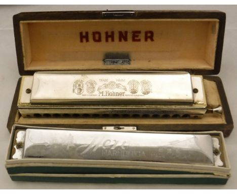 A Horner Chromonika III harmonica, in case, together with a Hero harmonica, in case