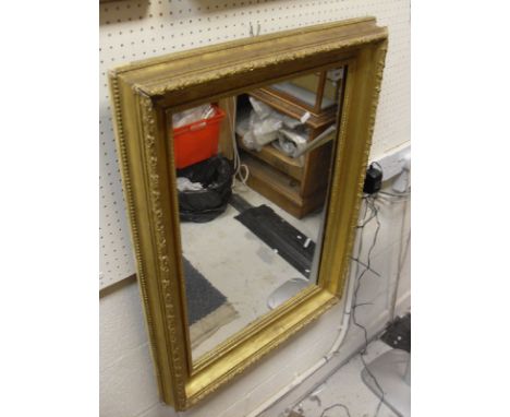 A giltwood and gesso framed rectangular wall mirror and a modern overmantle mirror CONDITION REPORTS Approx 86 cm x 64 cm.  H