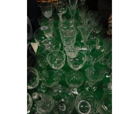 A collection of 19th and 20th Century glassware to include an enamel twist ale glass, various etched and engraved glasses, et