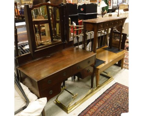 An oak hall table with applied moulded edge over five drawers on chamfered supports, together with a 20th Century oak coffee 