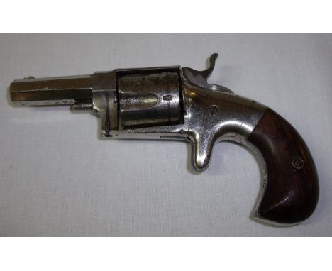 American Hopkins & Allen XL No. 4 .38 rim fire revolver serial number 309 Circa 1871 with octagonal barrel and various stamp 