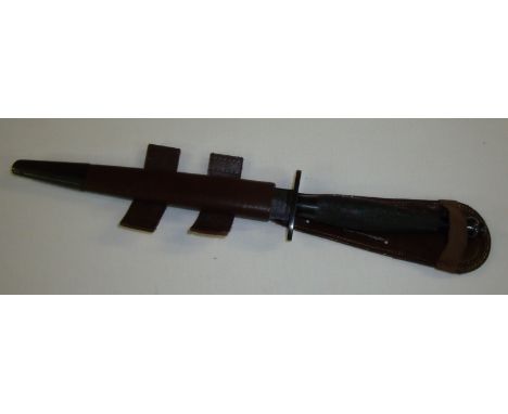 Fairbairn-Sykes Third Pattern Commando Fighting Knife, the 6.75inch double edged black blade marked The F-S Fighting KNife Wi