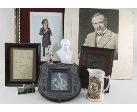VARIOUS ITEMS RELATING TO FORMER PRIME MINISTER DAVID LLOYD GEORGE (1863-1945) including (1) a carved slate easel portrait fr