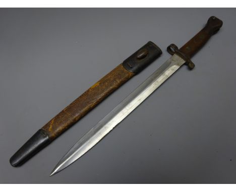 British Bayonet, 30.5cm steel blade with wooden slab grip, L42.5cm, in leather and steel scabbard Condition Report Click here