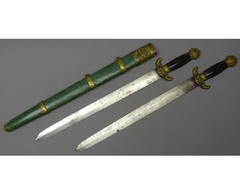 Chinese double sword Qing Dynasty each with 42cm diamond section steel blade, cast brass mounts and horn grip in shagreen cov