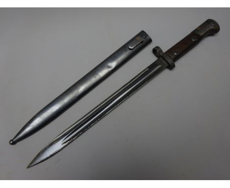 Czechoslovakian model 33/40 Mauser bayonet, the 30cm single edged fullered blued steel blade stamped to the ricasso CSZ over 