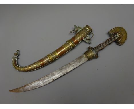 Indian Jambiya type knife, 24cm single edge curved steel blade, shaped hardwood grip with scratch carved detail and brass cap