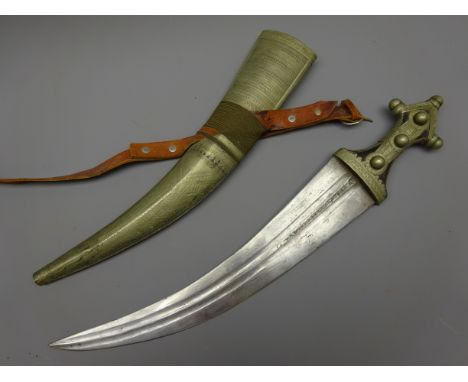 Middle Eastern dagger Jambiya with 35cm curving double fullered blade, white metal overlaid hilt and scabbard and leather str