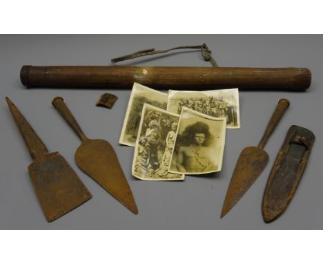Two Zulu iron spear heads decorated with dot and scrollwork, L29cm, and iron axe-head, nine barbed head arrows in quiver, a s