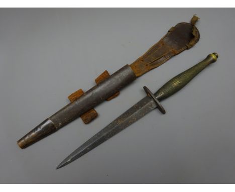 Fairbairn Sykes 2nd Pattern Commando Knife, 16.5cm twin edged blade, steel cross guard and brass chequered grip stamped L abo
