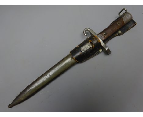 Austrian Bayonet, 25cm single edge fullered steel blade stamped CE over WG with hooked quillion, wooden slab grip stamped 7, 