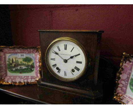 A late 19th Century walnut cased mantel clock with Roman enamelled dial signed Camerer Kuss &amp; Co, (a/f), with 8 day Winte