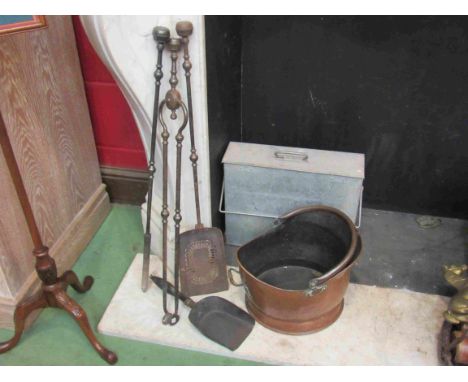 A copper coal bucket and fireside tools with Tippy ashpan