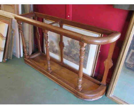 A 19th Century country house pitch pine large stick stand on turned supports, 123cm x 73cm x 29cm