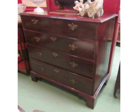 A George III mahogany chest circa 1800 of two short over three graduating long drawers on bracket feet, 96cm x 52cm x 92cm