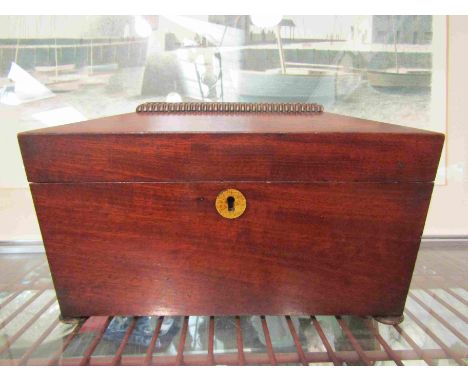 A sarcophagus shaped tea caddy on bun feet for restoration 