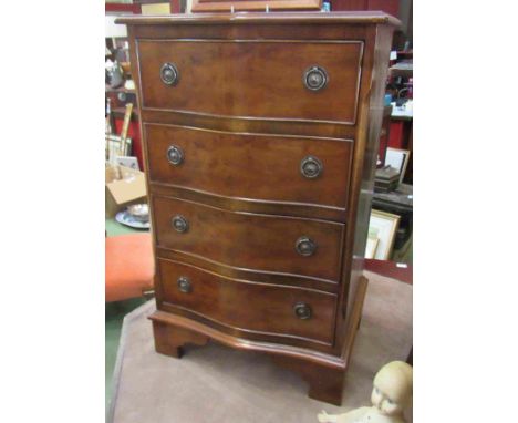 A Georgian style serpentine front chest of small proportions the four drawers on bracket feet, 74cm x 46cm x 35cm