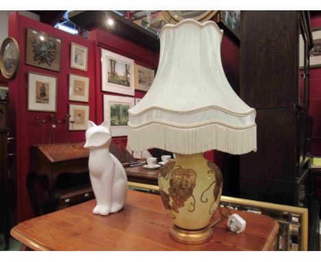 A modern ceramic table lamp with grapevine design with shade