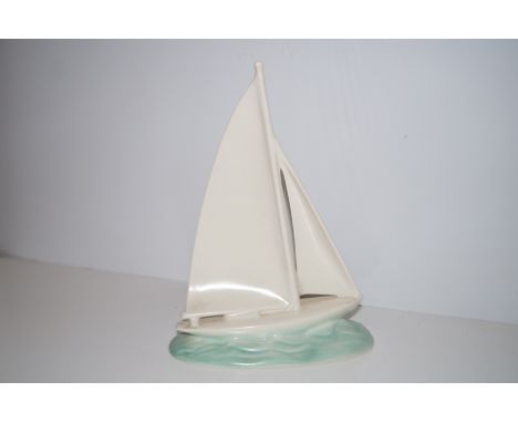 Poole pottery hand painted model of a yacht, height 26 cm