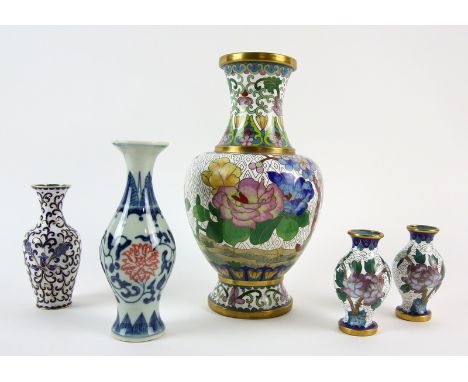 Chinese cloisonne vase decorated with birds, flowers and foliage, 21cm high, a smaller pair, another and a blue, white and ir