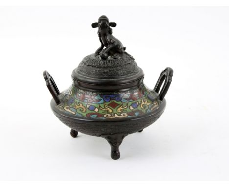 Chinese cloisonne twin-handled censer and cover with dog of fo finial, above a band of coloured decoration, on three mask and