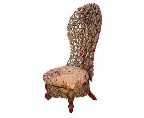 Chinese red lacquered and gilt high back chair, carved as scrolling foliage, with cushioned seat, 117cm high,.    