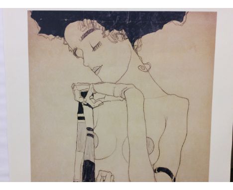 *A framed print by Egon Schiele.